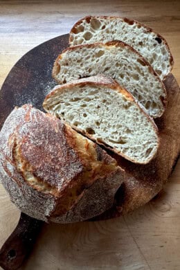 A loaf of Jim Lahey's bread on a board.