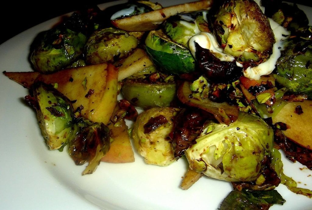 Charred Brussels sprouts, sweet apples, sour crème fraîche and toasted pistachios combine to form a delicious mixture of contrasting flavors and textures in this "Alta" tapas recreation. A balsamic vinegar reduction offers an at once sweet and sharp bite. // alexandracooks.com Charred Brussels sprouts, sweet apples, sour crème fraîche and toasted pistachios combine to form a delicious mixture of contrasting flavors and textures in this "Alta" tapas recreation. A balsamic vinegar reduction offers an at once sweet and sharp bite. // alexandracooks.com