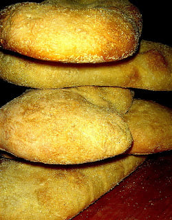 Ciabatta has a crisp crust, a soft porous interior and is light to the touch. The thin crusty exterior forms an ideal base to house heartier fillings such as roast beef, ham or grilled chicken breasts; and its soft interior absorbs spreads and sauces, without getting soggy—ciabatta holds up nicely under pulled pork, chicken parmesan and even hamburgers. // alexandracooks.com Ciabatta has a crisp crust, a soft porous interior and is light to the touch. The thin crusty exterior forms an ideal base to house heartier fillings such as roast beef, ham or grilled chicken breasts; and its soft interior absorbs spreads and sauces, without getting soggy—ciabatta holds up nicely under pulled pork, chicken parmesan and even hamburgers. // alexandracooks.com