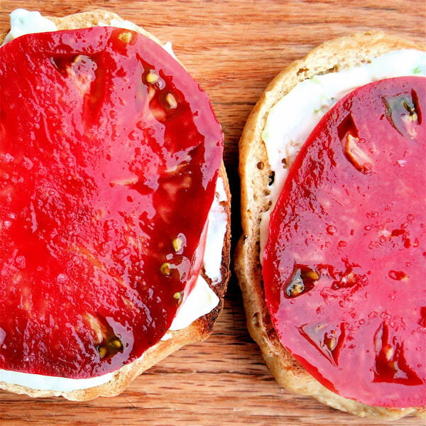 This has been my breakfast now for three days in a row: A toasted sesame bagel spread with chive cream cheese topped with a slice of tomato and sprinkled, of course, with sea salt. Amazing. // alexandracooks.com This has been my breakfast now for three days in a row: A toasted sesame bagel spread with chive cream cheese topped with a slice of tomato and sprinkled, of course, with sea salt. Amazing. // alexandracooks.com