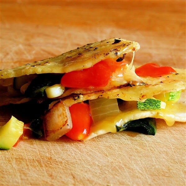 The vegetable sauté for these quesadillas will taste delectable in any tortilla. Just use whatever variety of flour or corn tortillas you prefer. In fact, while I am thrilled with the results of the fresh corn masa tortilla, this recipe is all about the filling. I am loving the taste of corn with basil right now. // alexandracooks.com The vegetable sauté for these quesadillas will taste delectable in any tortilla. Just use whatever variety of flour or corn tortillas you prefer. In fact, while I am thrilled with the results of the fresh corn masa tortilla, this recipe is all about the filling. I am loving the taste of corn with basil right now. // alexandracooks.com