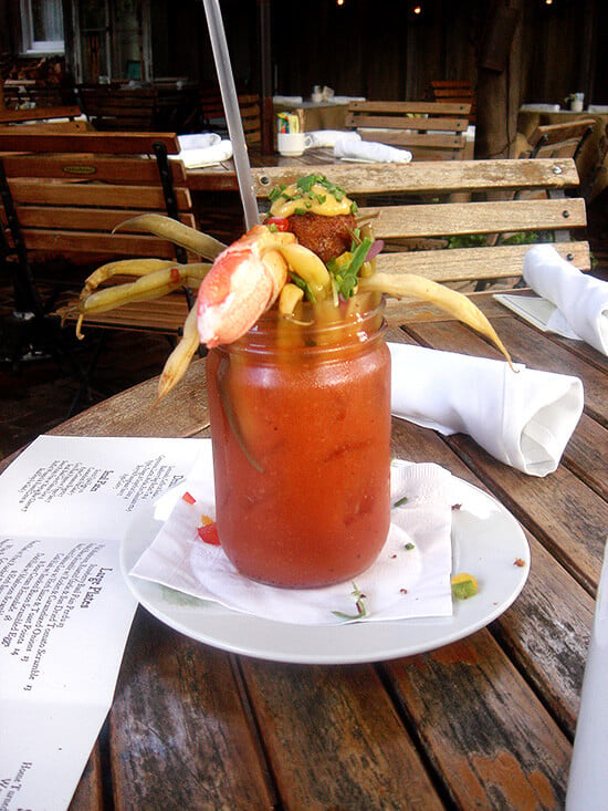 The Bloody Mary from Ramos House is the very best, teeming with pickled green beans, sprinkled with shredded basil and chives, and topped — completed — with a scotch quail egg that is. // alexandracooks.com The Bloody Mary from Ramos House is the very best, teeming with pickled green beans, sprinkled with shredded basil and chives, and topped — completed — with a scotch quail egg that is. // alexandracooks.com