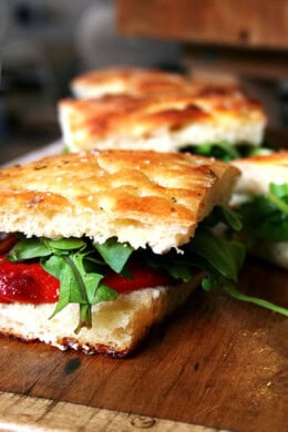 Next time you are invited to a potluck picnic, volunteer to make sandwiches. And then make these roasted red pepper and arugula sandwiches on homemade focaccia. You will be loved forever. I promise. // alexandracooks.com