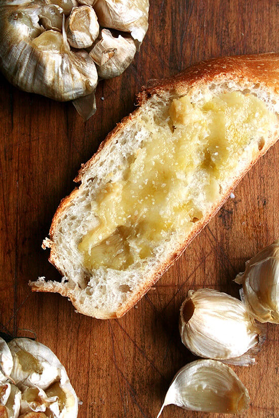Whole Roasted Garlic Spread on Warm Bread Whole Roasted Garlic Spread on Warm Bread