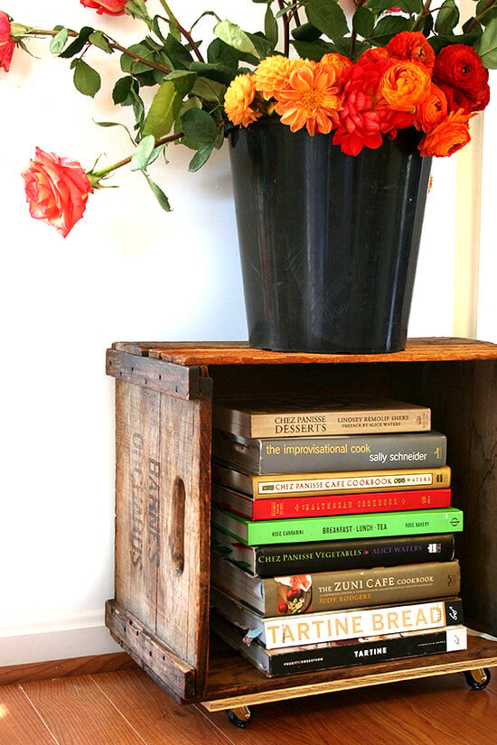 Looking for a purpose for old farm crates collecting dust in your basement? Try this farm crate bookshelf tutorial. It's not rocket science, will free up space in your home, and looks amazing! // alexandracooks.com Looking for a purpose for old farm crates collecting dust in your basement? Try this farm crate bookshelf tutorial. It's not rocket science, will free up space in your home, and looks amazing! // alexandracooks.com