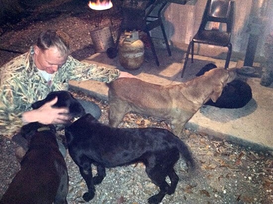 the husband, with dogs, never happier The husband, with dogs, never happier.