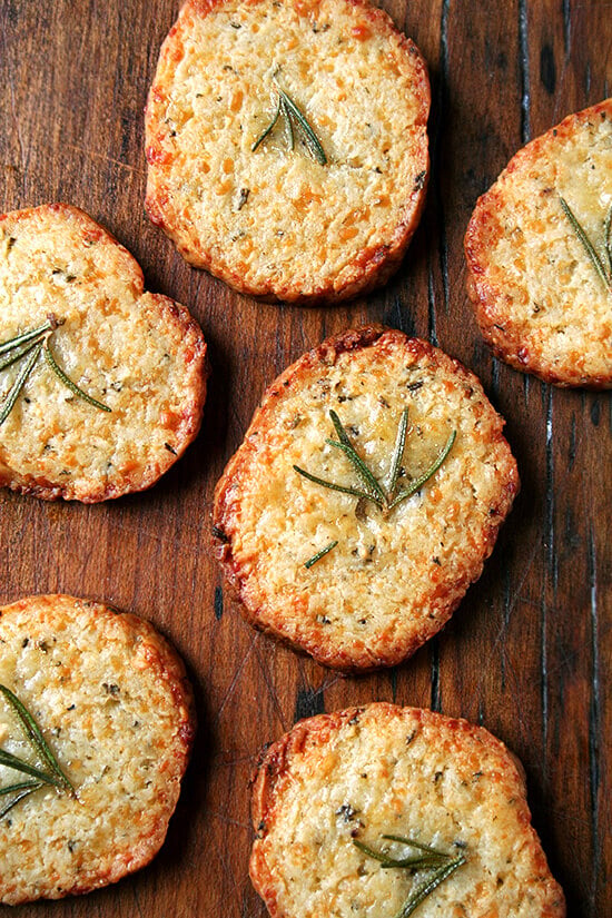 These salty parmesan rosemary crackers beg to be washed down with a heartwarming libation, one made with red wine and port, a little something called glogg. Glogg is potent stuff — bone-warming, rosy-cheek inducing, party-starting stuff. It's a beautiful thing. Happy New Year everyone! // alexandracooks.com These salty parmesan rosemary crackers beg to be washed down with a heartwarming libation, one made with red wine and port, a little something called glogg. Glogg is potent stuff — bone-warming, rosy-cheek inducing, party-starting stuff. It's a beautiful thing. Happy New Year everyone! // alexandracooks.com