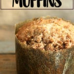 A coffeecake muffin on a board.