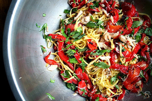 linguini, basil, crab and roasted red peppers all tossed together linguini, basil, crab and roasted red peppers all tossed together