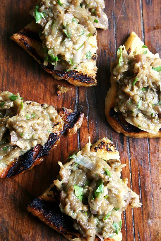 In this eggplant caviar, eggplant is roasted (as opposed to fried), which requires minimal oil, allowing the eggplant's sweet flavor to really shine. And after a gentle mashing with a fork, the eggplant's flesh becomes creamy, a perfect consistency to whip into a spread to spoon over grilled bread. // alexandracooks.com In this eggplant caviar, eggplant is roasted (as opposed to fried), which requires minimal oil, allowing the eggplant's sweet flavor to really shine. And after a gentle mashing with a fork, the eggplant's flesh becomes creamy, a perfect consistency to whip into a spread to spoon over grilled bread. // alexandracooks.com