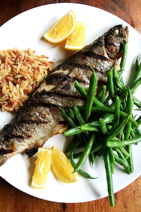 In grilled trout, when the skin crisps, and the meat flakes off the tiny delicate skeleton, tasting not a bit dry or fishy just fresh and delicious, never am I happier. This meal has become a recent favorite. Greens beans, needing nothing more than a three-minute steam and a drizzling of olive oil, freshly squeezed lemon, salt and pepper, are so good right now. And this brown butter orzo "risotto," is a long-time favorite.So easy, so delicious. // alexandracooks.com In grilled trout, when the skin crisps, and the meat flakes off the tiny delicate skeleton, tasting not a bit dry or fishy just fresh and delicious, never am I happier. This meal has become a recent favorite. Greens beans, needing nothing more than a three-minute steam and a drizzling of olive oil, freshly squeezed lemon, salt and pepper, are so good right now. And this brown butter orzo "risotto," is a long-time favorite.So easy, so delicious. // alexandracooks.com