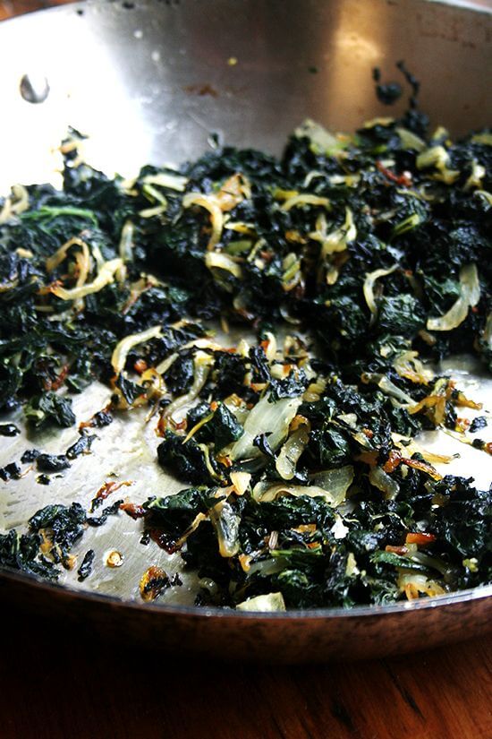 It's dishes such as this that make me understand (almost) how people can be vegetarian. In In this slow-cooked kale, kale is blanched first, roughly chopped and then sautéed over low heat for thirty minutes in olive oil with onions, garlic, rosemary and chile de árbol. It's almost black and slightly crispy when finished. It is sweet and addictive. // alexandracooks.com It's dishes such as this that make me understand (almost) how people can be vegetarian. In In this slow-cooked kale, kale is blanched first, roughly chopped and then sautéed over low heat for thirty minutes in olive oil with onions, garlic, rosemary and chile de árbol. It's almost black and slightly crispy when finished. It is sweet and addictive. // alexandracooks.com