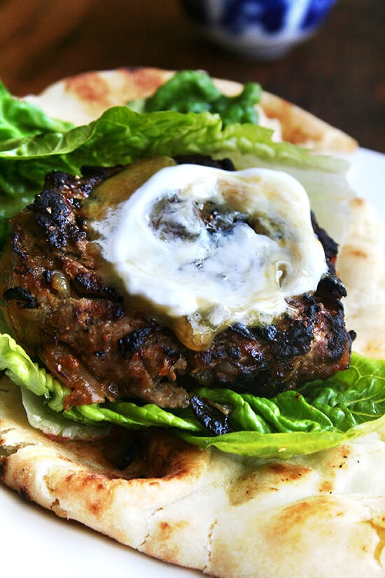 Seasoned with curry powder and cumin as well as caramelized onions and a dollop of chutney mustard, these lamb burgers might just be what you need to re-awaken those palates in this uninspiring in-between-seasons period. Serving the burgers in half pieces of warm naan with some crisp lettuce makes for a nice change from the standard burger bun. Cheese doesn't seem to fit here, but something cool and tangy like Greek yogurt is a must. // alexandracooks.com Seasoned with curry powder and cumin as well as caramelized onions and a dollop of chutney mustard, these lamb burgers might just be what you need to re-awaken those palates in this uninspiring in-between-seasons period. Serving the burgers in half pieces of warm naan with some crisp lettuce makes for a nice change from the standard burger bun. Cheese doesn't seem to fit here, but something cool and tangy like Greek yogurt is a must. // alexandracooks.com