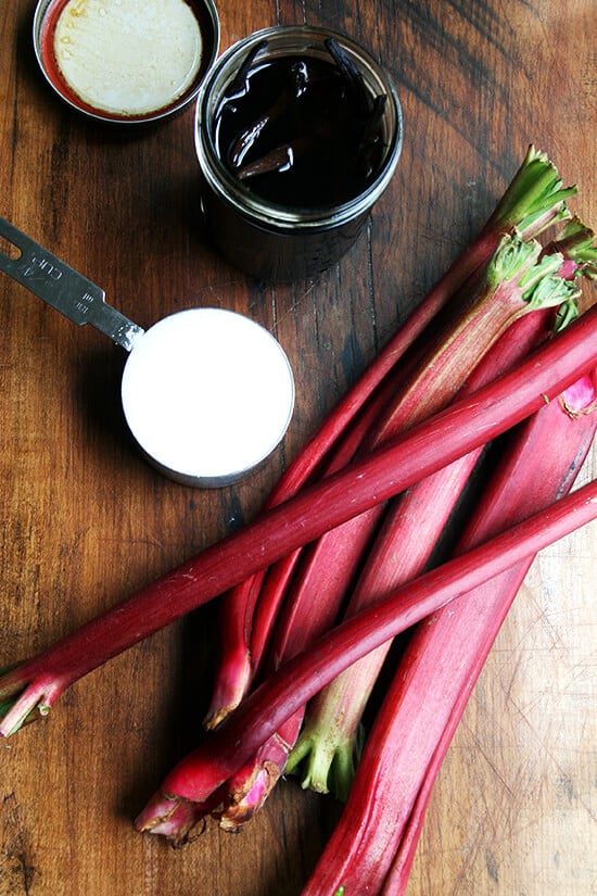 A board of rhubarb jam ingredients.