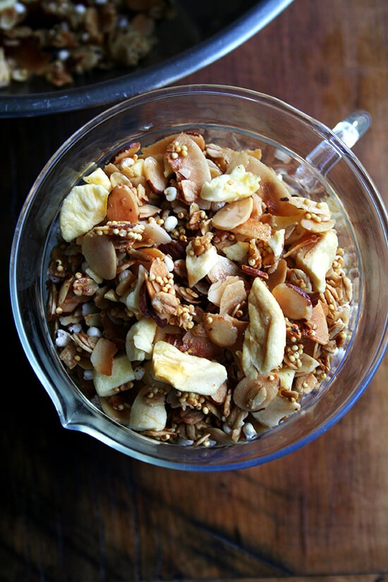 It comes as no surprise then that I absolutely adore this toasted muesli. Like granola, the oat mixture is toasted with a little oil — three tablespoons of olive oil — and a sweetener — a half cup of maple syrup. Like muesli, the mixture can be bulked up with dried fruit and puffed cereal or other grains and nuts. A healthy scoop of millet offers the nicest crunch, and the lightly toasted mixture, less sweet than granola, can be enjoyed with milk or yogurt alike. // alexandracooks.com It comes as no surprise then that I absolutely adore this toasted muesli. Like granola, the oat mixture is toasted with a little oil — three tablespoons of olive oil — and a sweetener — a half cup of maple syrup. Like muesli, the mixture can be bulked up with dried fruit and puffed cereal or other grains and nuts. A healthy scoop of millet offers the nicest crunch, and the lightly toasted mixture, less sweet than granola, can be enjoyed with milk or yogurt alike. // alexandracooks.com
