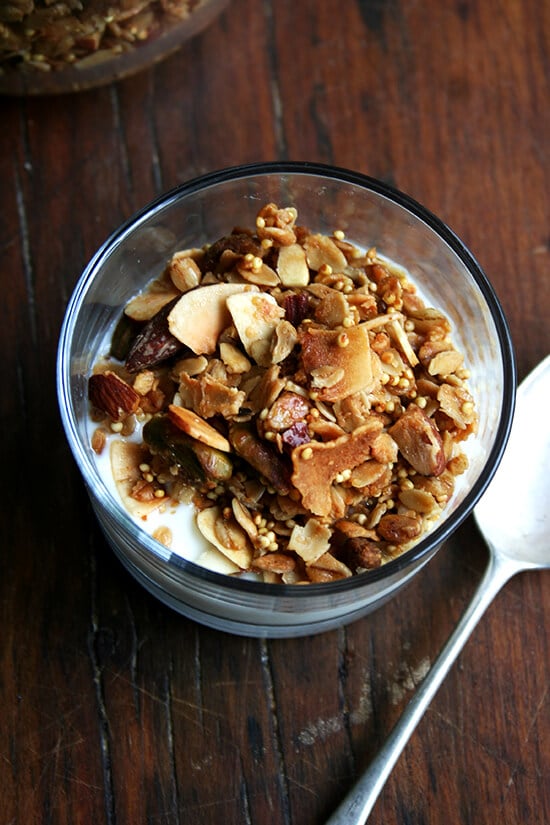 It comes as no surprise then that I absolutely adore this toasted muesli. Like granola, the oat mixture is toasted with a little oil — three tablespoons of olive oil — and a sweetener — a half cup of maple syrup. Like muesli, the mixture can be bulked up with dried fruit and puffed cereal or other grains and nuts. A healthy scoop of millet offers the nicest crunch, and the lightly toasted mixture, less sweet than granola, can be enjoyed with milk or yogurt alike. // alexandracooks.com It comes as no surprise then that I absolutely adore this toasted muesli. Like granola, the oat mixture is toasted with a little oil — three tablespoons of olive oil — and a sweetener — a half cup of maple syrup. Like muesli, the mixture can be bulked up with dried fruit and puffed cereal or other grains and nuts. A healthy scoop of millet offers the nicest crunch, and the lightly toasted mixture, less sweet than granola, can be enjoyed with milk or yogurt alike. // alexandracooks.com