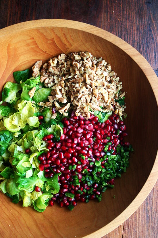 This brussels sprout salad, an amalgam of flavors and textures — sweet brussels sprouts, spicy jalapeños, crisp and tart pomegranate seeds, and crunchy toasted walnuts — will add a spot of color and a touch of freshness, a perfect counter to the creamy potatoes and the buttery bird on the Christmas dinner table. // alexandracooks.com This brussels sprout salad, an amalgam of flavors and textures — sweet brussels sprouts, spicy jalapeños, crisp and tart pomegranate seeds, and crunchy toasted walnuts — will add a spot of color and a touch of freshness, a perfect counter to the creamy potatoes and the buttery bird on the Christmas dinner table. // alexandracooks.com