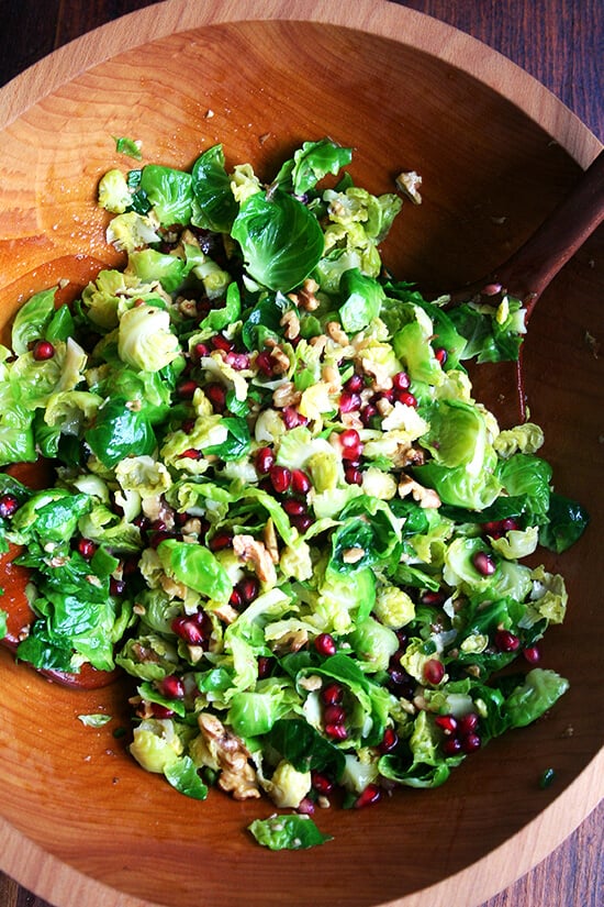 This brussels sprout salad, an amalgam of flavors and textures — sweet brussels sprouts, spicy jalapeños, crisp and tart pomegranate seeds, and crunchy toasted walnuts — will add a spot of color and a touch of freshness, a perfect counter to the creamy potatoes and the buttery bird on the Christmas dinner table. // alexandracooks.com This brussels sprout salad, an amalgam of flavors and textures — sweet brussels sprouts, spicy jalapeños, crisp and tart pomegranate seeds, and crunchy toasted walnuts — will add a spot of color and a touch of freshness, a perfect counter to the creamy potatoes and the buttery bird on the Christmas dinner table. // alexandracooks.com