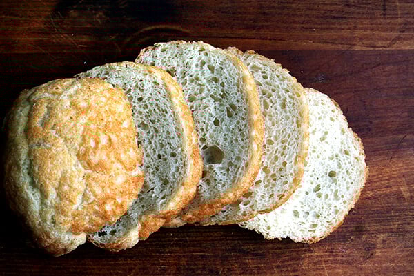 peasant bread, sliced on a board