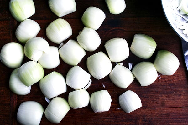halved onions on a board