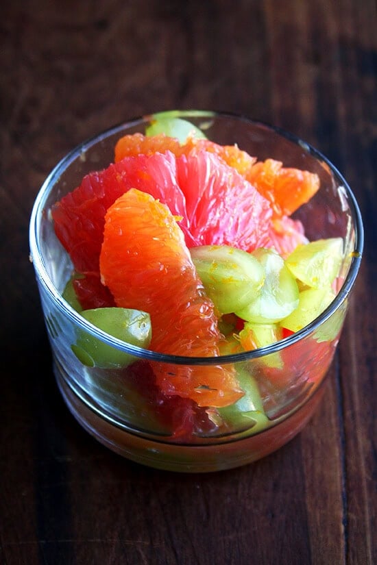This grape compote mixture of orange, grapefruit and slivered grapes tossed together with citrus sugar and juice is fresh and light and makes an elegant dessert or a nice addition to any breakfast or brunch. And while it's simple in theory to throw together — fruit and sugar are tossed with fresh juice — somehow it takes more time to assemble than you might anticipate. But don't let that deter you. All of the zesting and supreming and slivering are worth every effort. // alexandracooks.com This grape compote mixture of orange, grapefruit and slivered grapes tossed together with citrus sugar and juice is fresh and light and makes an elegant dessert or a nice addition to any breakfast or brunch. And while it's simple in theory to throw together — fruit and sugar are tossed with fresh juice — somehow it takes more time to assemble than you might anticipate. But don't let that deter you. All of the zesting and supreming and slivering are worth every effort. // alexandracooks.com