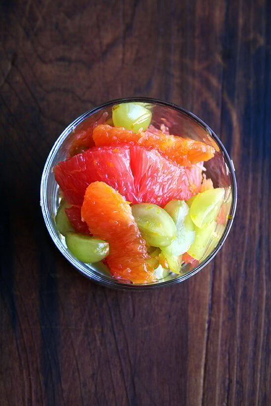 This grape compote mixture of orange, grapefruit and slivered grapes tossed together with citrus sugar and juice is fresh and light and makes an elegant dessert or a nice addition to any breakfast or brunch. And while it's simple in theory to throw together — fruit and sugar are tossed with fresh juice — somehow it takes more time to assemble than you might anticipate. But don't let that deter you. All of the zesting and supreming and slivering are worth every effort. // alexandracooks.com This grape compote mixture of orange, grapefruit and slivered grapes tossed together with citrus sugar and juice is fresh and light and makes an elegant dessert or a nice addition to any breakfast or brunch. And while it's simple in theory to throw together — fruit and sugar are tossed with fresh juice — somehow it takes more time to assemble than you might anticipate. But don't let that deter you. All of the zesting and supreming and slivering are worth every effort. // alexandracooks.com