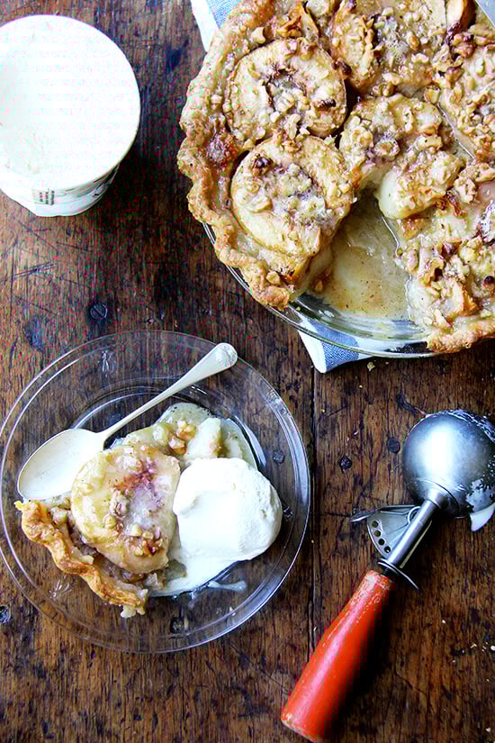 German peach pie, which may or may not be German at all, is like an open-faced pie made with four halved, peeled peaches topped with a butter-sugar-egg mixture and a small sprinkling of nuts. When it bakes, this vanilla custard bubbles around the peach halves, which, after the hour in the oven, become spoon tender and are utterly delicious. Vanilla ice cream is a must as is a crew to help polish off the spoils, though pie for breakfast isn't the worst thought either. // alexandracooks.com German peach pie, which may or may not be German at all, is like an open-faced pie made with four halved, peeled peaches topped with a butter-sugar-egg mixture and a small sprinkling of nuts. When it bakes, this vanilla custard bubbles around the peach halves, which, after the hour in the oven, become spoon tender and are utterly delicious. Vanilla ice cream is a must as is a crew to help polish off the spoils, though pie for breakfast isn't the worst thought either. // alexandracooks.com