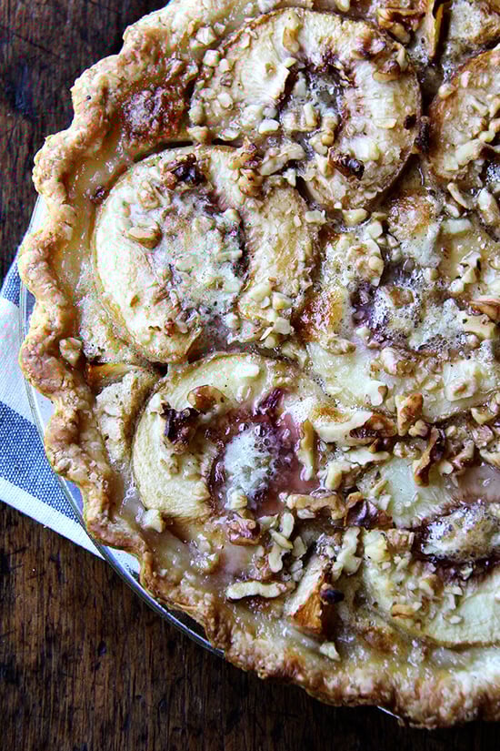 German peach pie, which may or may not be German at all, is like an open-faced pie made with four halved, peeled peaches topped with a butter-sugar-egg mixture and a small sprinkling of nuts. When it bakes, this vanilla custard bubbles around the peach halves, which, after the hour in the oven, become spoon tender and are utterly delicious. Vanilla ice cream is a must as is a crew to help polish off the spoils, though pie for breakfast isn't the worst thought either. // alexandracooks.com German peach pie, which may or may not be German at all, is like an open-faced pie made with four halved, peeled peaches topped with a butter-sugar-egg mixture and a small sprinkling of nuts. When it bakes, this vanilla custard bubbles around the peach halves, which, after the hour in the oven, become spoon tender and are utterly delicious. Vanilla ice cream is a must as is a crew to help polish off the spoils, though pie for breakfast isn't the worst thought either. // alexandracooks.com