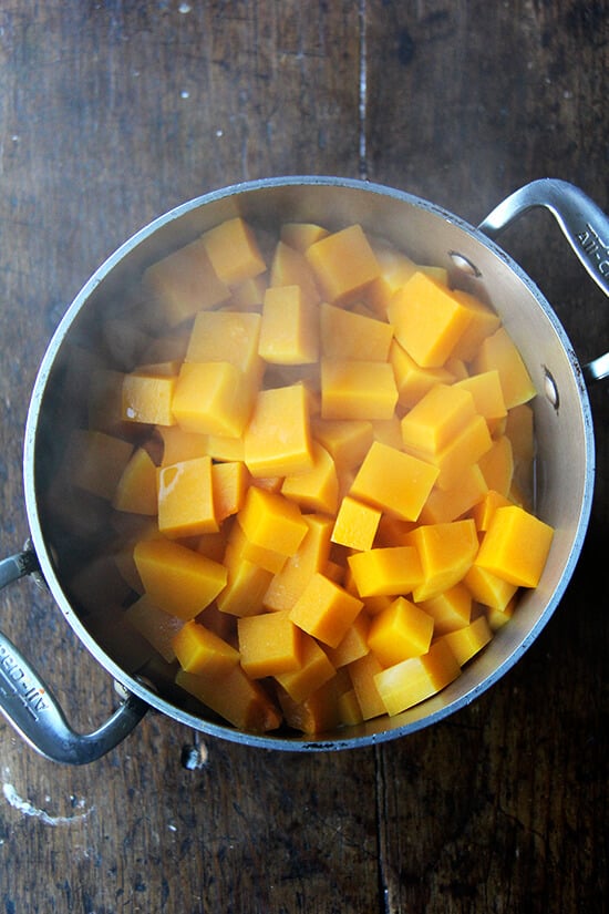 A soup pot with steamed squash.