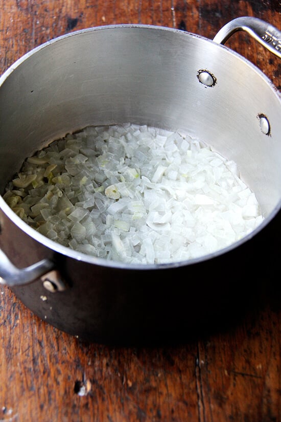 A soup pot with onions and garlic, softened.