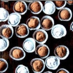 Boozy chocolate truffles on a table.