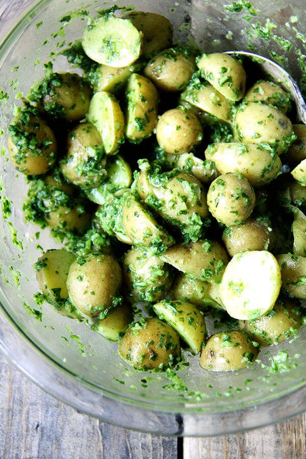 tossing the potatoes