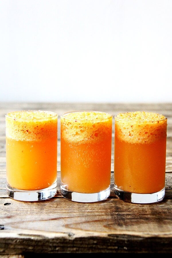 This peach bellini recipe is made by throwing whole peaches, skins and all, into the blender. It is a breeze to throw together and tastes light, summery and refreshing — maybe something festive to consider this weekend? // alexandracooks.com This peach bellini recipe is made by throwing whole peaches, skins and all, into the blender. It is a breeze to throw together and tastes light, summery and refreshing — maybe something festive to consider this weekend? // alexandracooks.com