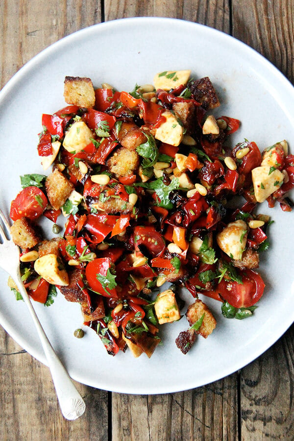 Folded into olive oil-fried bread, this magic peppers salad made a lovely panzanella salad but could have easily become a bruschetta or simple grain or pasta salad. Much to my delight, making this panzanella felt nothing like hard work. It was almost as though the salad assembled itself. Perhaps "hard work" is a state of mind. Hmm...deep thoughts. // alexandracooks.com Folded into olive oil-fried bread, this magic peppers salad made a lovely panzanella salad but could have easily become a bruschetta or simple grain or pasta salad. Much to my delight, making this panzanella felt nothing like hard work. It was almost as though the salad assembled itself. Perhaps "hard work" is a state of mind. Hmm...deep thoughts. // alexandracooks.com