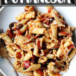 A plate of pasta puttanesca.