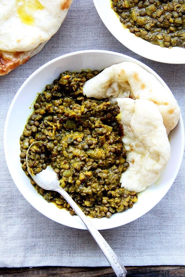 This two-lentil dal is delicious and couldn't be simpler to throw together: sweat an onion, add spices (cumin, coriander fennel, turmeric and crushed red pepper flakes) and lentils, cover with water, simmer until done. The result, a happy mix of creamy and chunky, like a partially puréed soup, will be very welcomed at the table. // alexandracooks.com This two-lentil dal is delicious and couldn't be simpler to throw together: sweat an onion, add spices (cumin, coriander fennel, turmeric and crushed red pepper flakes) and lentils, cover with water, simmer until done. The result, a happy mix of creamy and chunky, like a partially puréed soup, will be very welcomed at the table. // alexandracooks.com