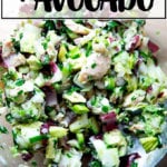 A bowl of smoked trout and avocado salad.