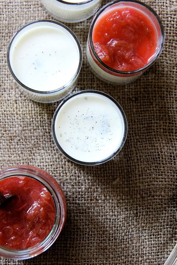 This rhubarb compote is delicious and easy and light (tasting, at least). It also found purpose for the rhubarb I had picked up last week: a sweet-tart lemony compote, a perfect spring lily-gilding condiment. // alexandracooks.com Overhead shot of buttermilk panna cotta topped with rhubarb compote.