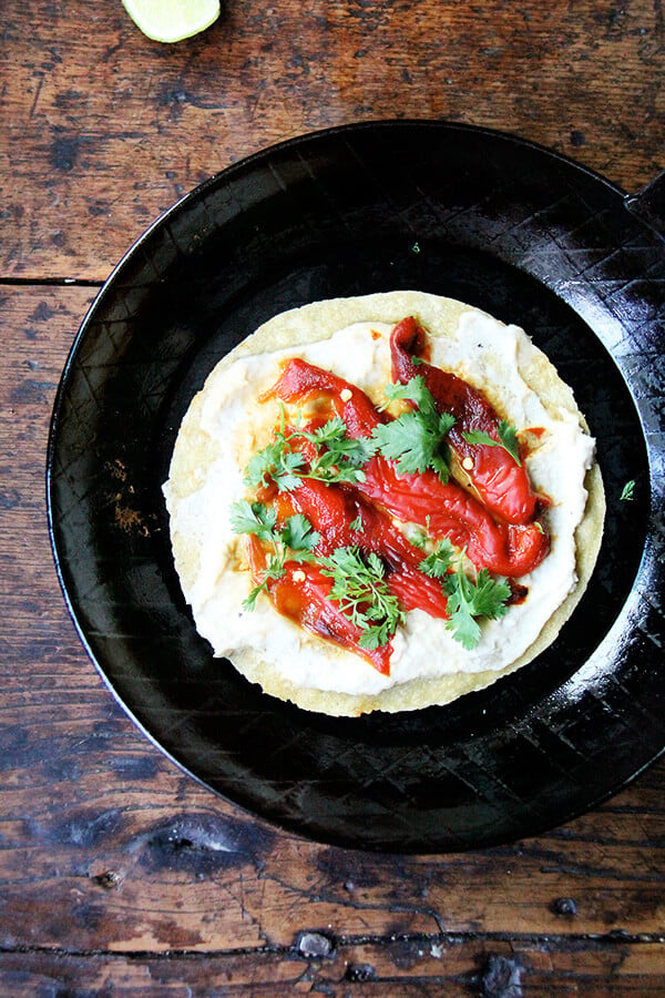 With a stash of peppers in the fridge, these roasted red pepper wraps come together in no time, and they're as easy to make for one as for a crowd. They're what I've been relying on as my motivation to do anything, namely cook, wanes with every degree out there it climbs. // alexandracooks.com With a stash of peppers in the fridge, these roasted red pepper wraps come together in no time, and they're as easy to make for one as for a crowd. They're what I've been relying on as my motivation to do anything, namely cook, wanes with every degree out there it climbs. // alexandracooks.com