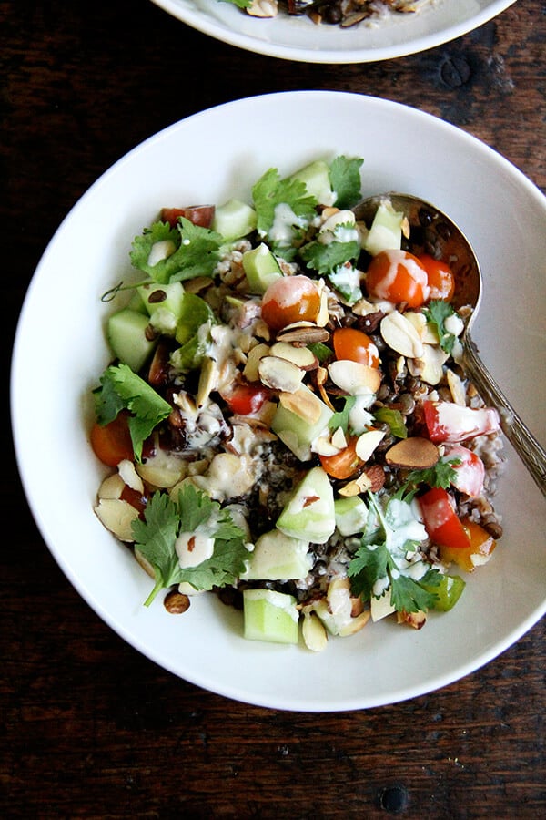 I can't seem to get enough of this bulgar bowl: a mix of bulgur and lentils, chopped cucumbers and tomatoes, toasted almonds, cilantro, and a lemon-tahini dressing. When you have some of the components prepared ahead of time, the assembly happens quickly! // alexandracooks.com I can't seem to get enough of this bulgar bowl: a mix of bulgur and lentils, chopped cucumbers and tomatoes, toasted almonds, cilantro, and a lemon-tahini dressing. When you have some of the components prepared ahead of time, the assembly happens quickly! // alexandracooks.com