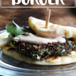 A plate topped with a crispy quinoa cake and tahini sauce.