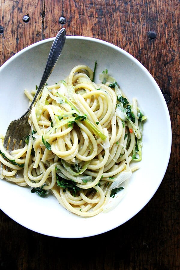 Here, leeks, garlic, pepper flakes, olive oil, pasta and water unite at the start and simmer together until the bucatini is cooked and the starchy cooking water has emulsified with the olive oil, reducing into a silky, spicy, aromatic sauce that tastes creamy without cream and rich without any enrichment. // alexandracooks.com Here, leeks, garlic, pepper flakes, olive oil, pasta and water unite at the start and simmer together until the bucatini is cooked and the starchy cooking water has emulsified with the olive oil, reducing into a silky, spicy, aromatic sauce that tastes creamy without cream and rich without any enrichment. // alexandracooks.com