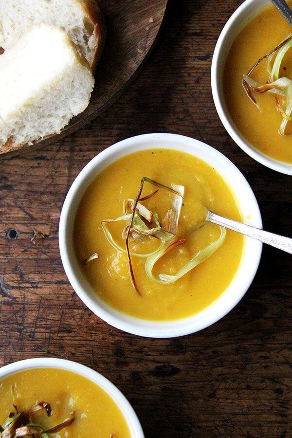 Slow-cooker butternut squash soup in bowls.