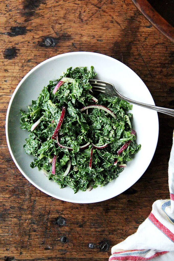 In this kale Cesar salad, the dressing is light and lemony and the kale itself is extremely soft and tender. It's also vegan, the dressing made with vegannaise and vegan Worcestershire. The combination of curly kale, massaged till tender, quick-pickled onions, and toasted pumpkin seeds, which add so much texture and flavor, is so good. I think this is one you have to taste to believe. // alexandracooks.com In this kale Cesar salad, the dressing is light and lemony and the kale itself is extremely soft and tender. It's also vegan, the dressing made with vegannaise and vegan Worcestershire. The combination of curly kale, massaged till tender, quick-pickled onions, and toasted pumpkin seeds, which add so much texture and flavor, is so good. I think this is one you have to taste to believe. // alexandracooks.com