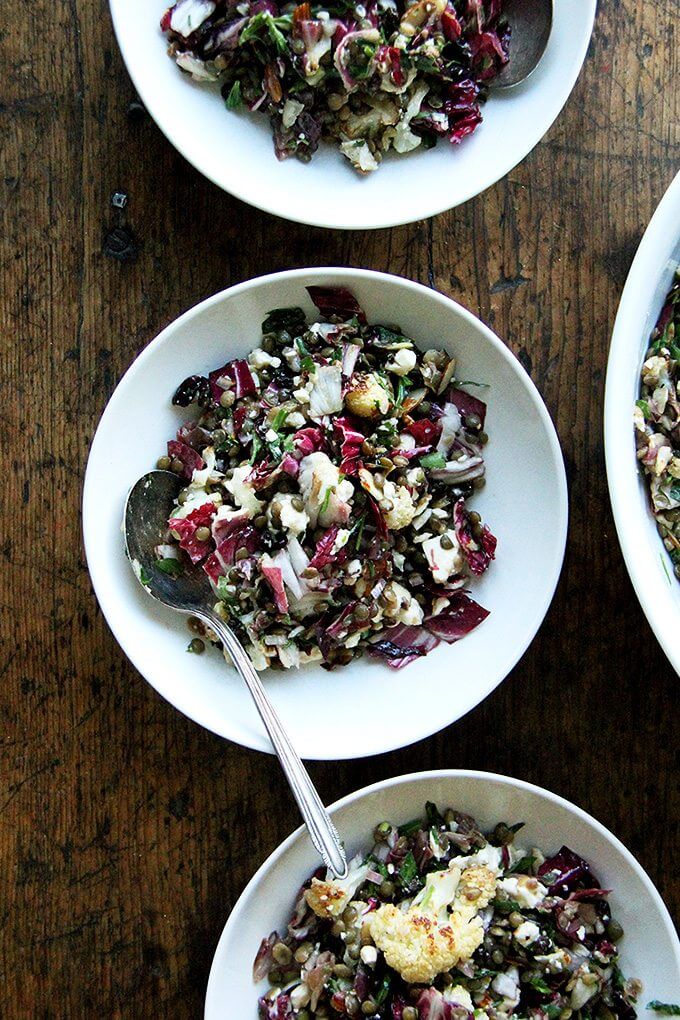 This salad is a combination of roasted vegetables, lentils, walnuts, and goat cheese. But there's a lot more to it than what's revealed in the title. There's raw radicchio, lots of fresh tarragon, and it's all dressed in an at once sharp, sweet, and salty dressing made with minced anchovies, shallots, mustard, honey, and currants. The whole combination is just so good. // alexandracooks.com This salad is a combination of roasted vegetables, lentils, walnuts, and goat cheese. But there's a lot more to it than what's revealed in the title. There's raw radicchio, lots of fresh tarragon, and it's all dressed in an at once sharp, sweet, and salty dressing made with minced anchovies, shallots, mustard, honey, and currants. The whole combination is just so good. // alexandracooks.com