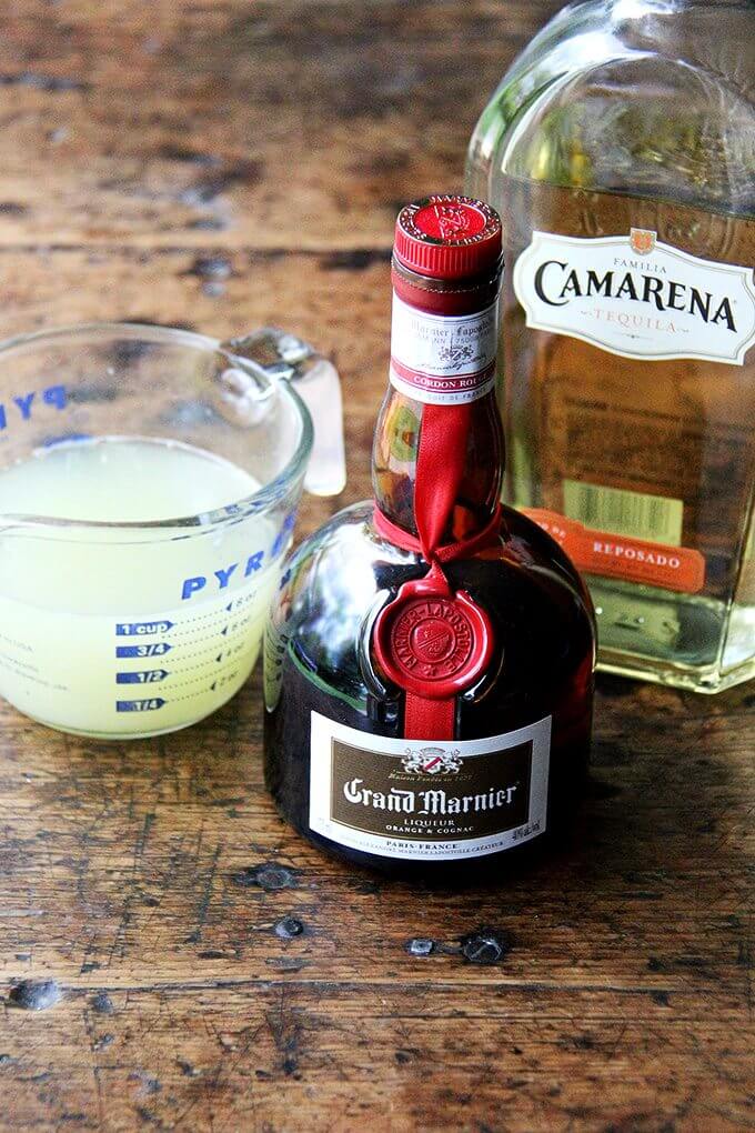 Margarita ingredients: fresh lime juice, grand marnier, tequila.