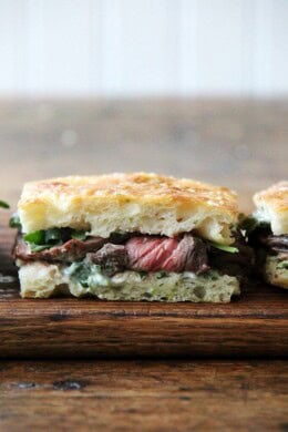 In these skirt steak sandwiches, skirt steak, which cooks to medium-rare in just about 5 minutes, is layered with arugula between slices of focaccia smeared with herbed mayonnaise. The key, as with all meats, is to let the steak rest for at least 10 minutes before slicing, and with skirt steak, to slice it thinly against the grain. // alexandracooks.com