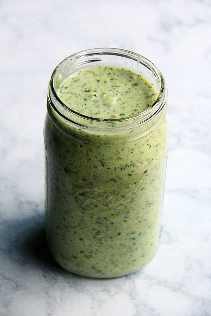 This cucumber and green grape gazpacho is one of my favorites: cucumber and green grape gazpacho, a variation of the chilled Spanish soup ajo blanco. It's loaded with dill and heavy on the vinegar, which gives it a nice bite. Sweet green grapes balance this sharpness, and a clove of minced garlic gives it a surprising zing. With the help of a food processor, it comes together in a snap // alexandracooks.com A jar of cucumber and green grape gazpacho.