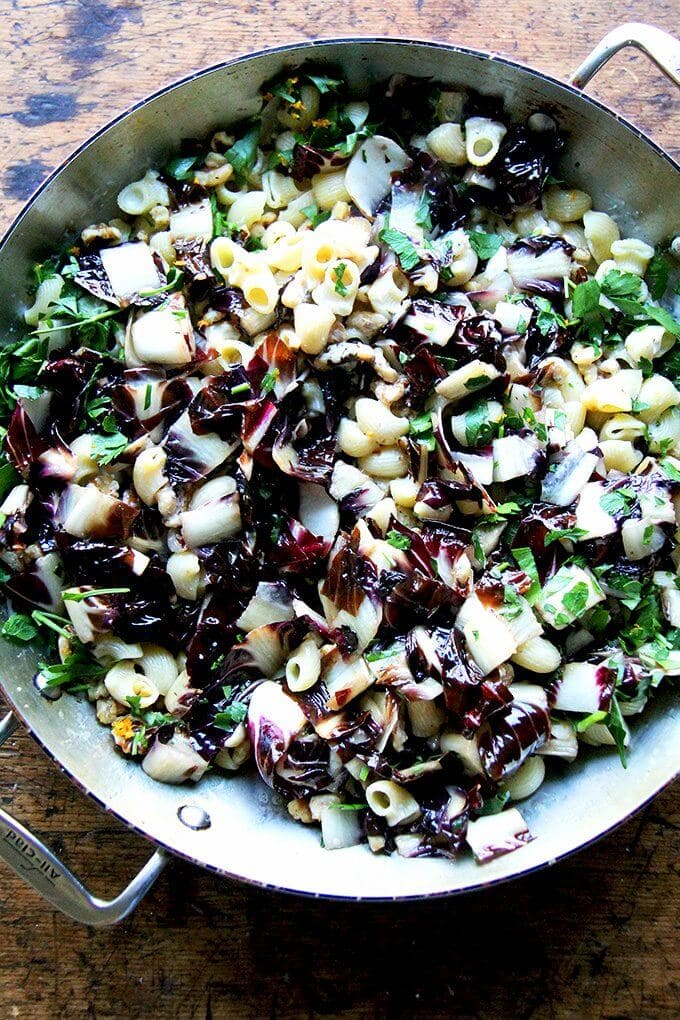 In less than 10 minutes, this radicchio pasta enters the pan, the silky sauce enveloping it along with the walnuts, parsley, and orange zest. Lots of fresh cracked pepper and shavings of Pecorino at the table completed the dish. // alexandracooks.com In less than 10 minutes, this radicchio pasta enters the pan, the silky sauce enveloping it along with the walnuts, parsley, and orange zest. Lots of fresh cracked pepper and shavings of Pecorino at the table completed the dish. // alexandracooks.com