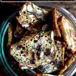 A jar of homemade 3-seed crackers.